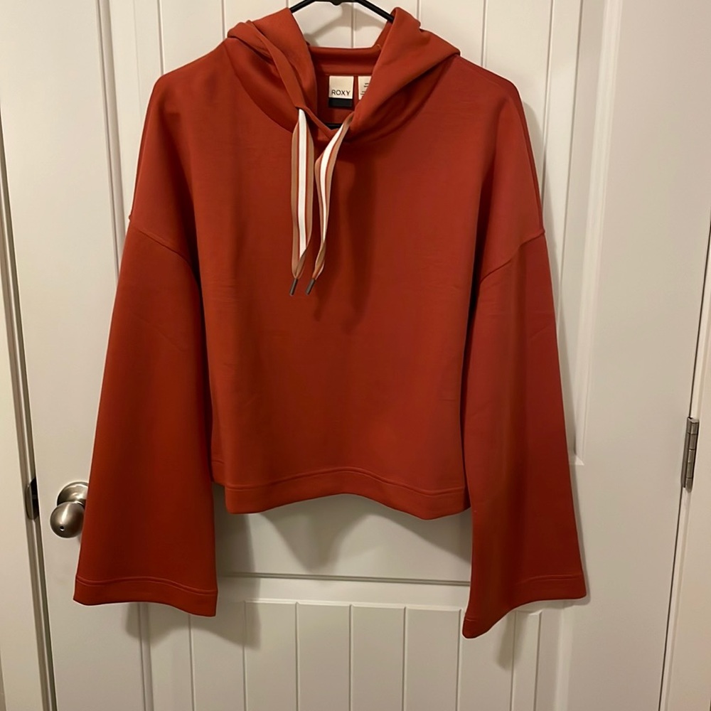 Orange sweater with hood size medium